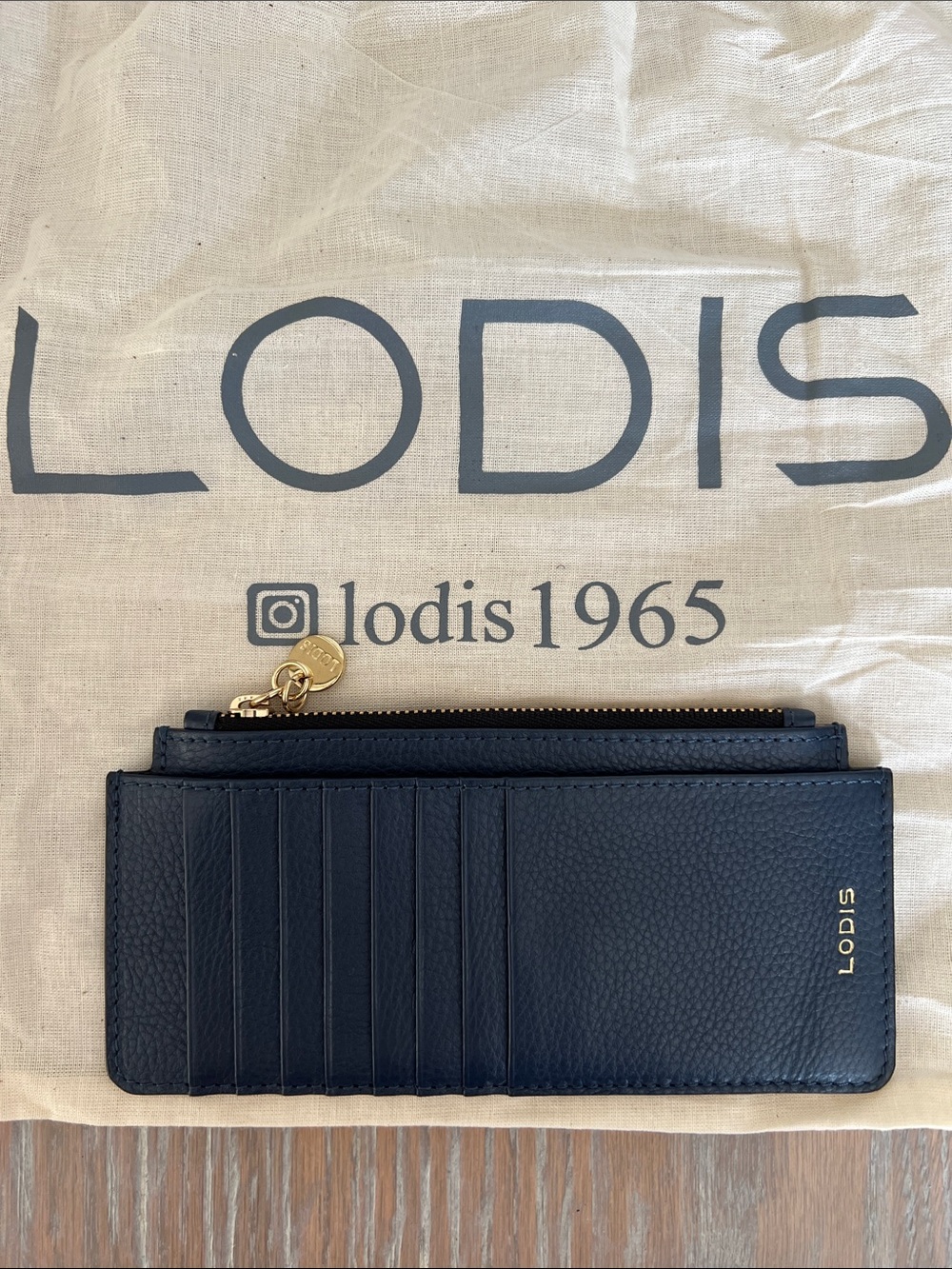 Lodis Navy Leather Card Wallet with Gold Zipper Pull